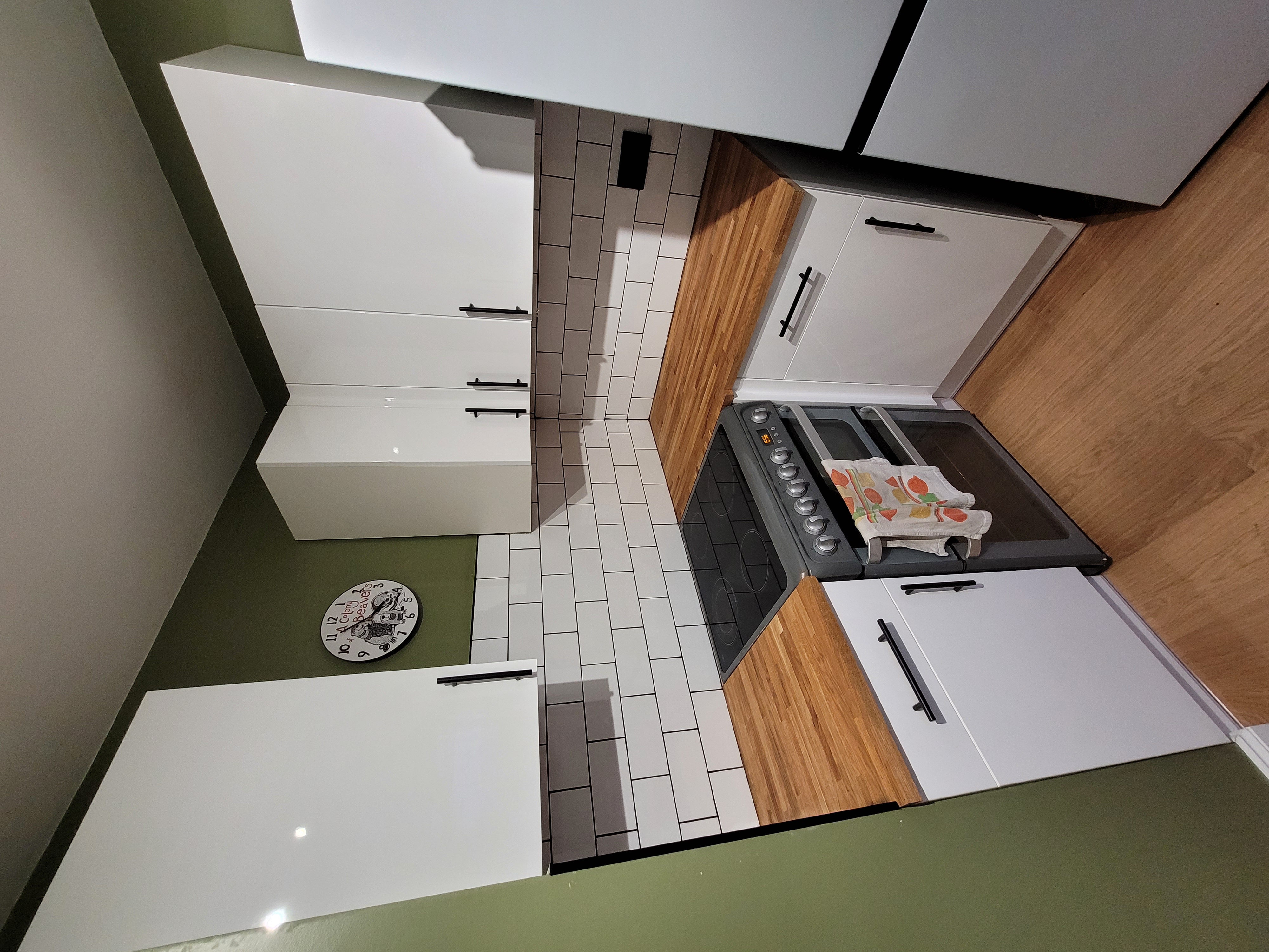 An after photo of the other side of the kitchen from the same just other side